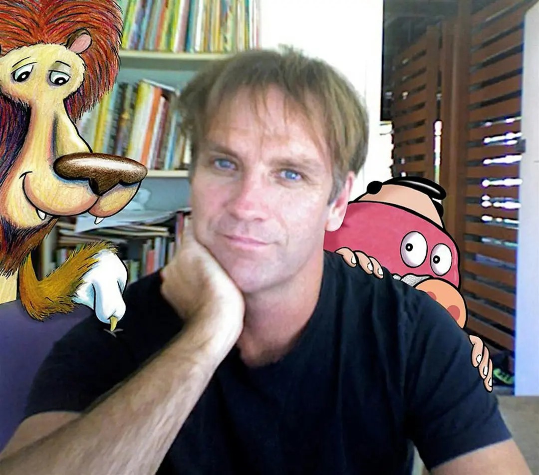 Photo of Mark Guthrie with two illustrated characters next to each of his shoulders.